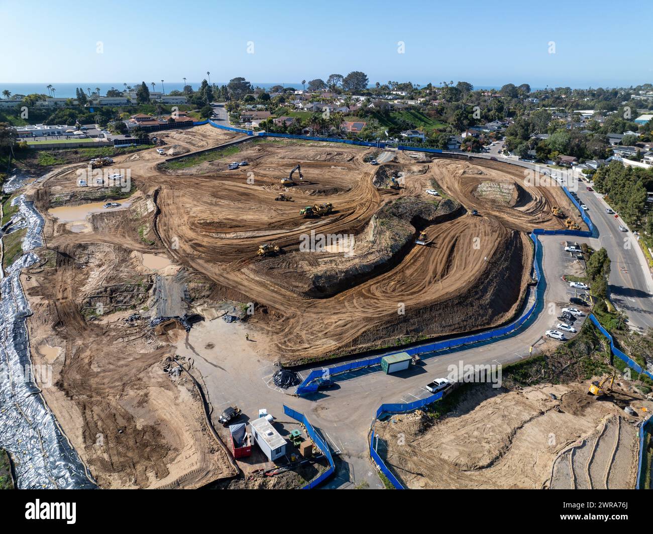Aerial view of heavy construction equipment working at the construction