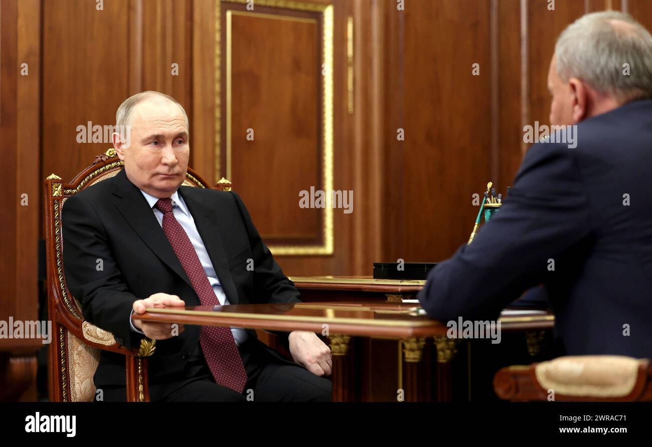Moscow, Russia. 11th Mar, 2024. Russian President Vladimir Putin, left, holds a face-to-face working meeting with Russian state space agency Roscosmos Director General Yury Borisov, right, at the Kremlin, March 11, 2024 in Moscow, Russia. Credit: Mikhail Metzel/Kremlin Pool/Alamy Live News Stock Photo