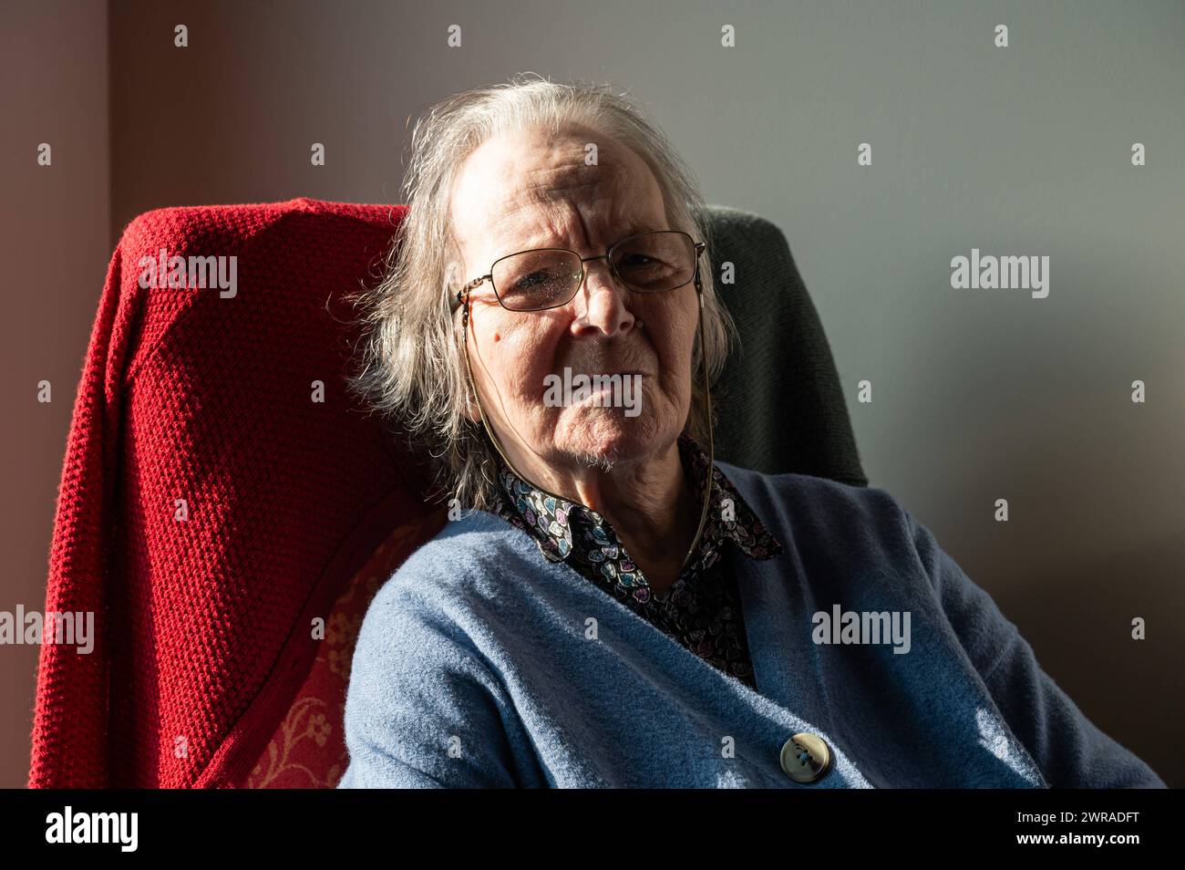 Portrait of an 85 yo white grandmother looking sad, Tienen, Flemish Brabant, Belgium. Model Released Stock Photo
