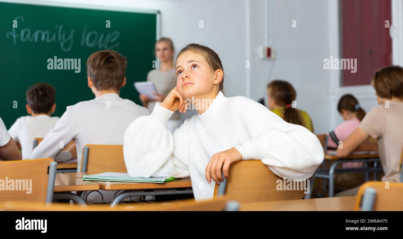 Girl feeling upset after getting bad mark at school Stock Photo - Alamy
