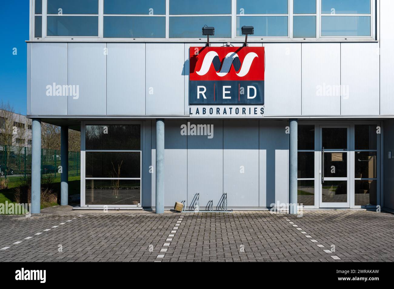 Zellik, Flemish Brabant, Belgium March 8, 2024 - Facade of the RED laboratories, doing research on long term diseases Stock Photo