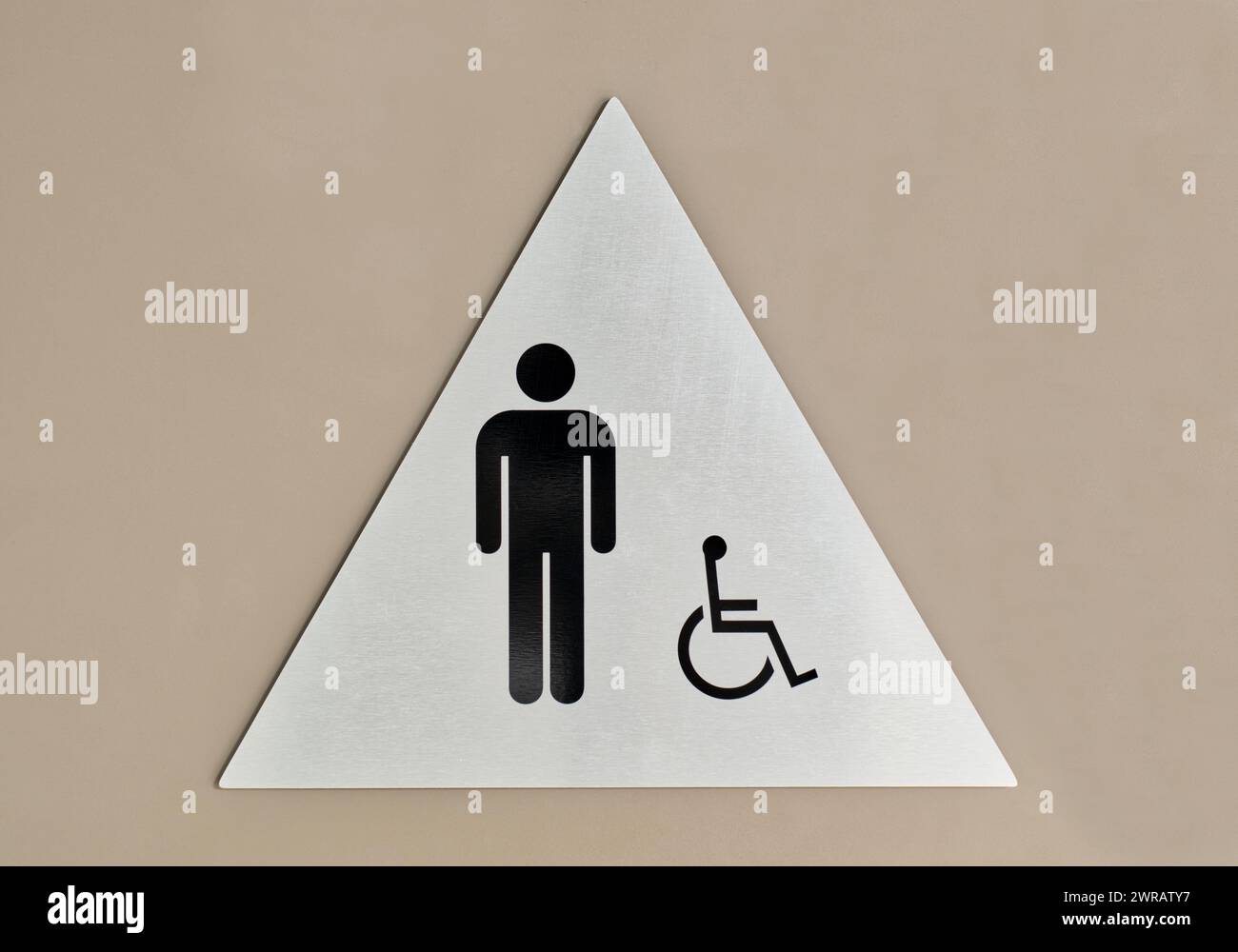 Men's bathroom and handicap sign on a door. Circular sign and symbol designation placard. Stock Photo