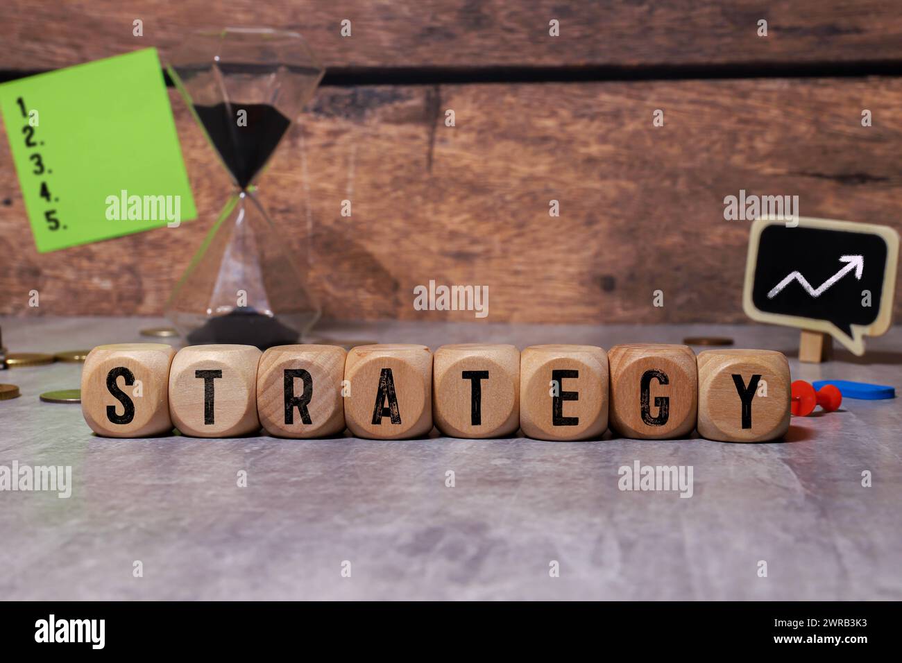 STRATEGY word made with building blocks. Stock Photo