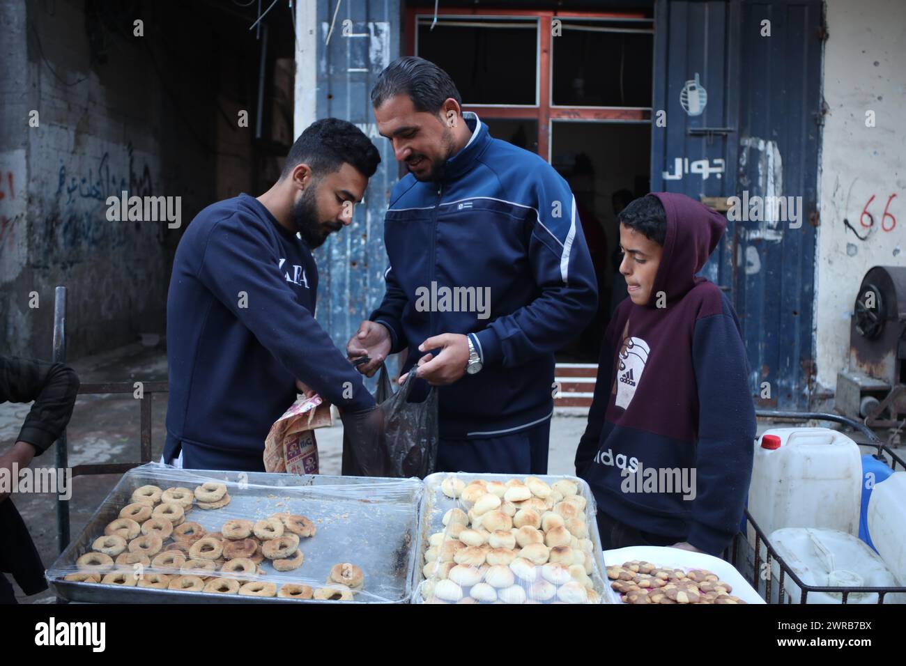Gaza. 11th Mar, 2024. People shop at a market during Ramadan in central Gaza Strip, on March 11, 2024. Credit: Xinhua/Alamy Live News Stock Photo