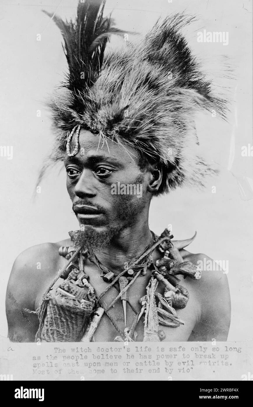Native types of Africa, 192-, Photo shows a witch doctor, head-and-shoulders portrait, facing left, wearing headdress and many necklaces., Carpenter, Frank G. (Frank George), 1855-1924, collector, between 1920 and 1930, Shamans, Africa, 1920-1930, Photographic prints, 1920-1930., Portrait photographs, 1920-1930, Photographic prints, 1920-1930, 1 photographic print Stock Photo