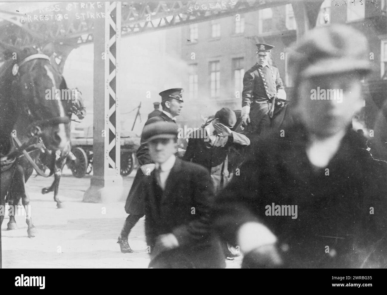 Two policemen arresting a striker in Express strike, New York City, 1910, Law enforcement, New York (State), New York, 1910, Photographic prints, 1910., Photographic prints, 1910, 1 photographic print Stock Photo