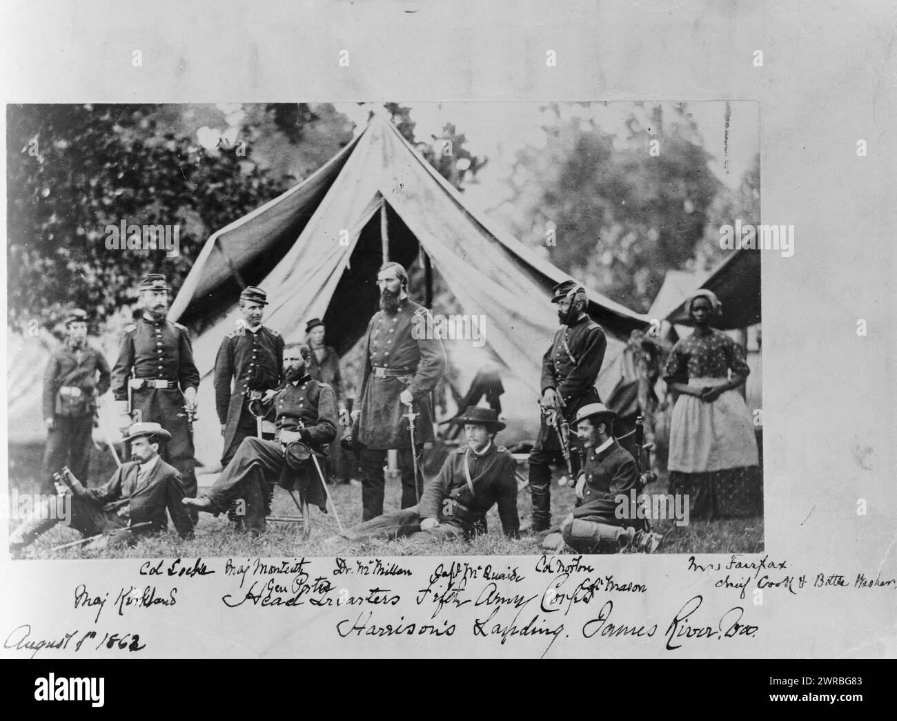 Headquarters Fifth Army Corps, Harrison's Landing, James River, Va., Nine soldiers and an African American cook posed in front of tent., August 8?, 1862., African Americans, Employment, Virginia, Harrisons Landing, 1860-1870, Group portraits, 1860-1870., Portrait photographs, 1860-1870, Group portraits, 1860-1870, 1 photographic print: printing out paper print Stock Photo
