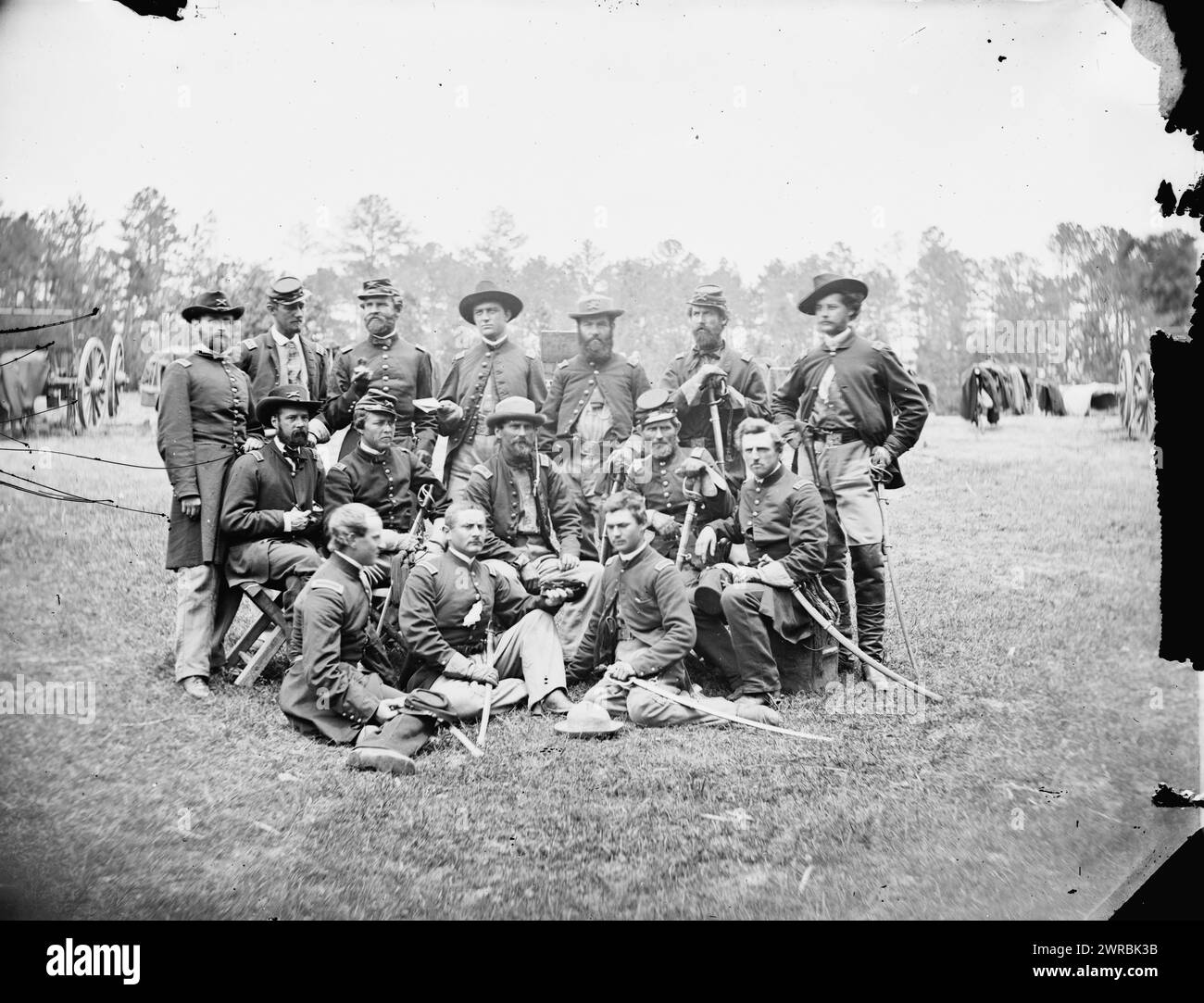 Fair Oaks, Va., vicinity. Brigade officers of the Horse Artillery commanded by Lt. Col. William Hays, Photograph from the main eastern theater of war, the Peninsular Campaign, May-August 1862. Standing, left to right: Lt. Edmund Pendleton, PLt. Alex C. M. Pennington, Capt. Henry Benson, Capt, H. M. Gibson, Lt. James E. Wilson, Capt. John C. Tidball, Lt. William N. Dennison. Seated, left to right: Capt. Horatio Gibson, Lt. Peter C. Hains, Lt. Col. William Hays, Capt. James M. Robertson, Lt. J. W. Barlow. Seated on the ground, left to right: Lt. Robert H. Chapin, Lt. Robert Clarke Stock Photo