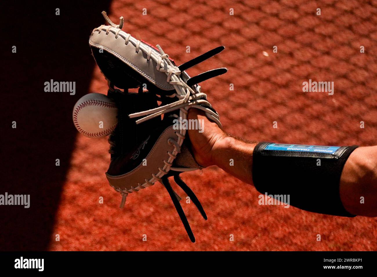 Seattle Mariners catcher Seby Zavala makes a catch in the bullpen
