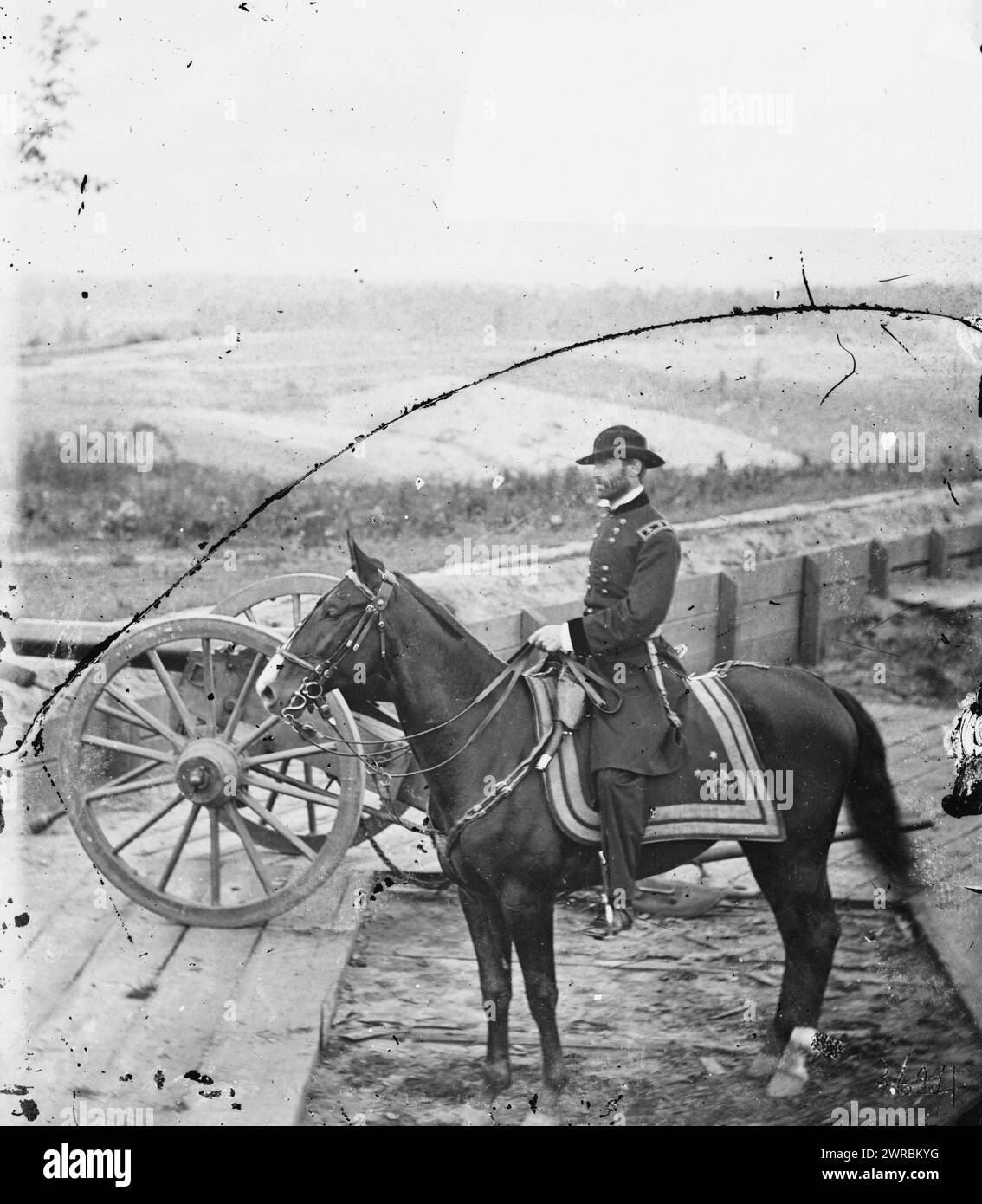 Atlanta, Ga. Gen. William T. Sherman on horseback at Federal Fort No. 7, Photograph of the War in the West. These photographs are of Sherman in Atlanta, September-November, 1864. After three and a half months of incessant maneuvering and much hard fighting, Sherman forced Hood to abandon the munitions center of the Confederacy. Sherman remained there, resting his war-worn men and accumulating supplies, for nearly two and a half months. During the occupation, George N. Barnard, official photographer of the Chief Engineer's Office Stock Photo