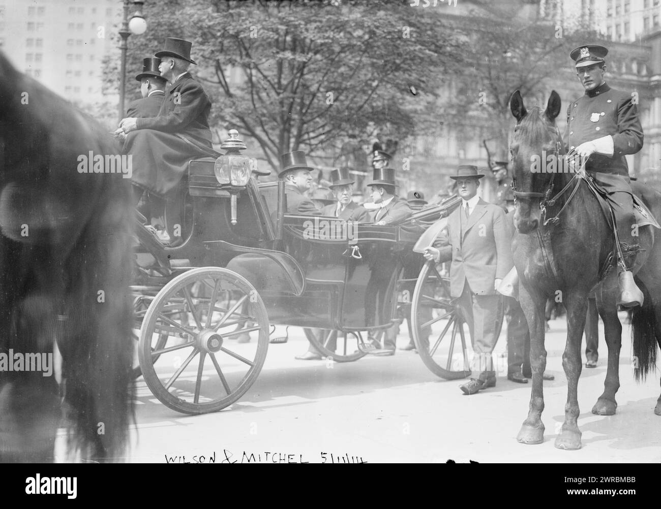 Wilson & Mitchel, 1914, Photograph shows President Woodrow Wilson with Mayor John Purroy Mitchel (1879-1918) and his secretary Joseph Patrick Tumulty in New York City, during the procession before the National Memorial Service on May 11, 1914 in honor of the seamen and marines who were killed in Veracruz, Mexico during the Mexican Revolution., 1914 May 11, Glass negatives, 1 negative: glass Stock Photo