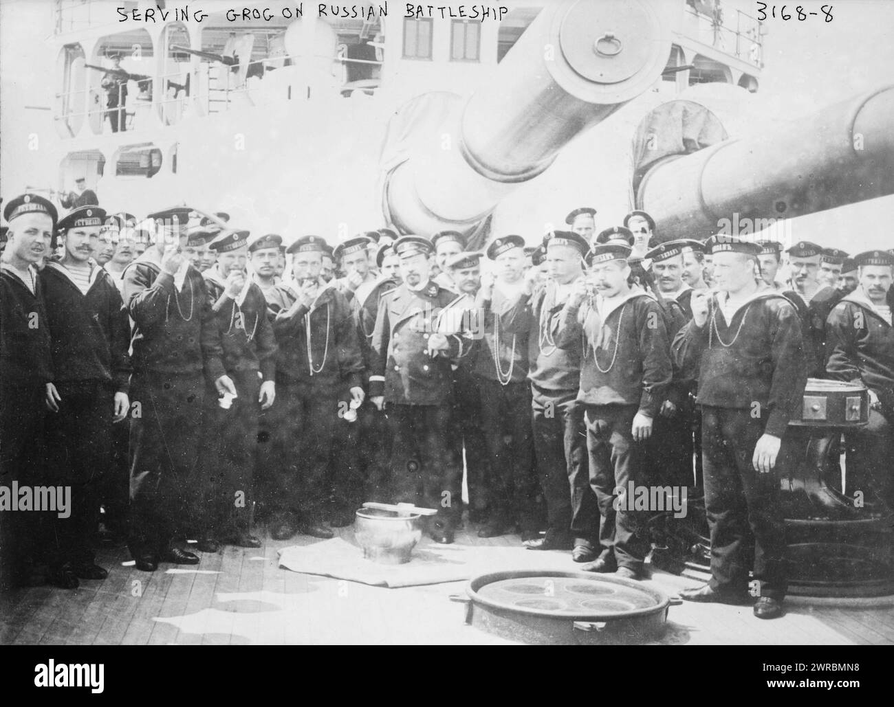Serving grog on Russian Battleship, Photograph shows crew aboard the Russian warship, Retvizan., between ca. 1910 and ca. 1915, Glass negatives, 1 negative: glass Stock Photo
