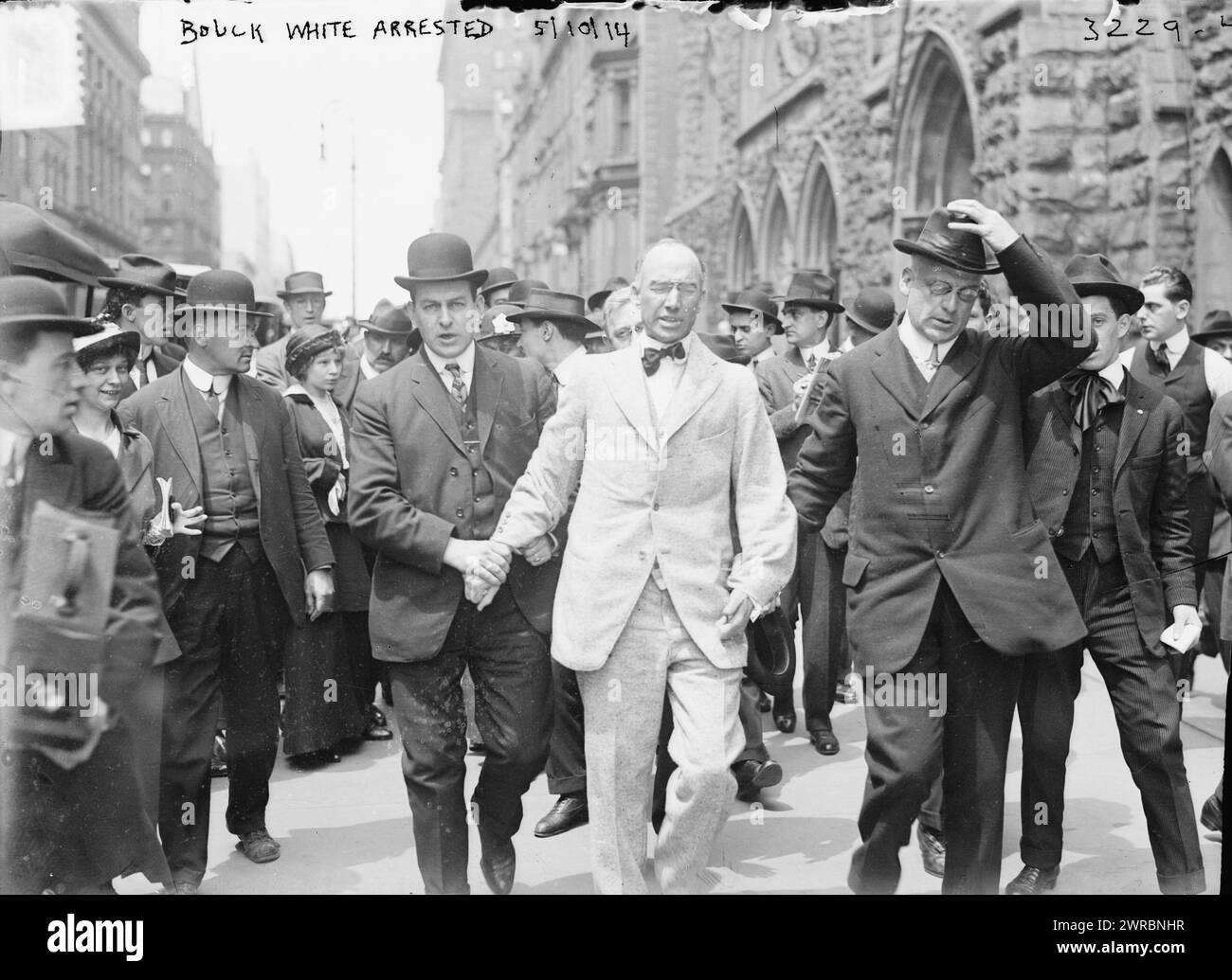 Bouck White arrested, Photograph shows the arrest of minister and socialist Bouck White (1874-1951), who was detained for disrupting a service at Calvary Baptist Church, West 57th Street, New York City, the church where John D. Rockefeller worshiped., 1914 May 10, Glass negatives, 1 negative: glass Stock Photo