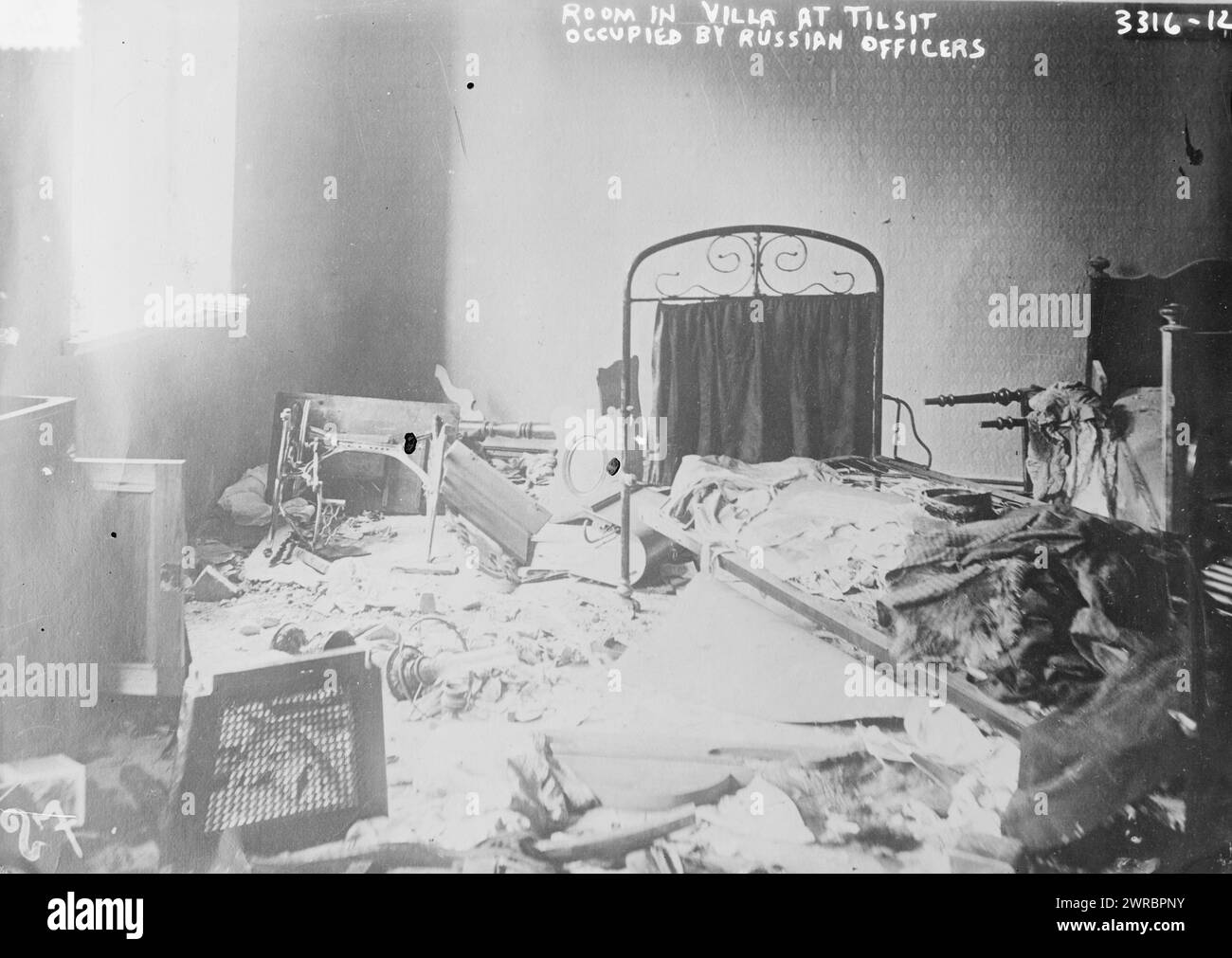 Room in villa at Tilsit occupied by Russian officers, Photograph shows a room in a villa occupied by Russian soldiers during World War I, in Sovetsk (Tilsit), Russia., between ca. 1914 and ca. 1915, World War, 1914-1918, Glass negatives, 1 negative: glass Stock Photo