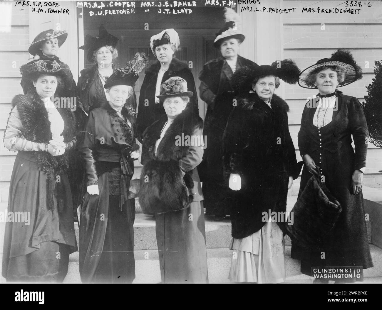 Mrs. T.P. Gore, Mrs. H.A. Cooper, Mrs. J.E. Baker i.e., Raker, Mrs. F.M. Briggs, Mrs. H.M. Towner, Mrs D.U. Fletcher, Mrs J.T. Lloyd. Mrs. L.P. Padgett, Mrs. Fred. Dennett, Photograph shows wives of congressmen in front of the Ladies Congressional Club of Washington, D.C. Depicted are President Mrs. Duncan U. Fletcher, Vice Presidents Mrs. Frank H. Briggs, Mrs. Henry A. Cooper, Mrs. Thomas P. Gore, Mrs. James T. Lloyd and Mrs. Lemuel P. Padgett; recording secretary Mrs. Horace M. Towner, corresponding secretary Mrs. John E. Raker and Treasurer Mrs. Fred Dennett., 1915, Glass negatives Stock Photo