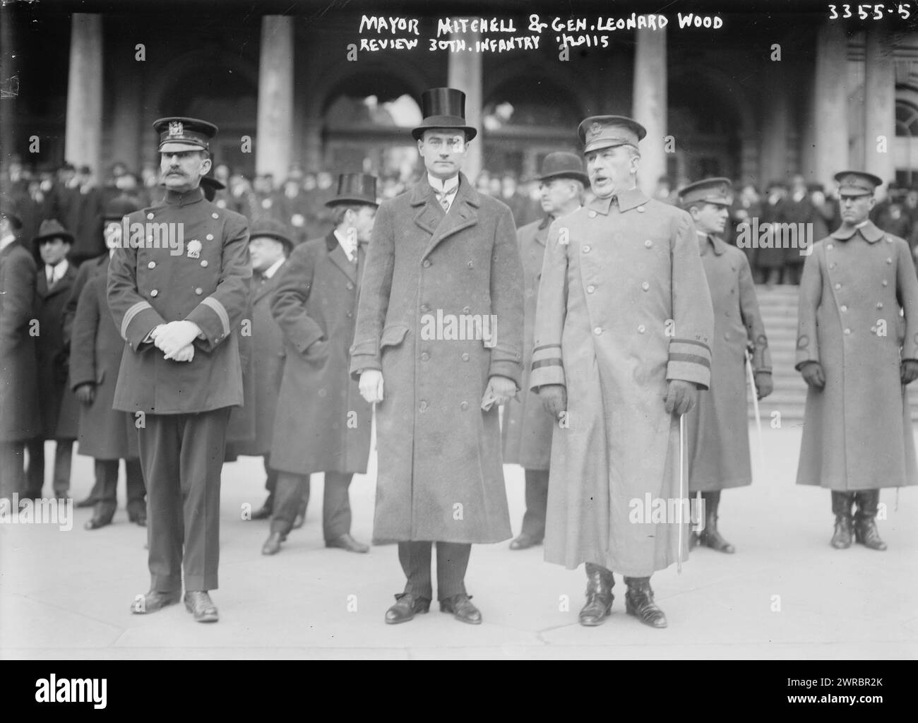 Mayor Mitchell i.e., Mitchel & Gen. Leonard Wood review 30th Infantry, Photograph shows Mayor John Purroy Mitchel (center), Major General Leonard Wood (right) and Police Commissioner Arthur Woods (left) reviewing the 30th U.S. Infantry as they passed City Hall, New York City., 1915 Jan. 20, Glass negatives, 1 negative: glass Stock Photo