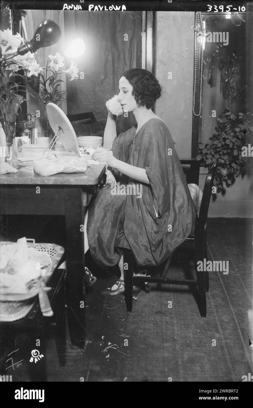 Anna Pavlowa, Photograph shows Russian ballerina Anna Pavlova (Pavlovna) (1881-1931), seated at a dressing table., between ca. 1910 and ca. 1915, Glass negatives, 1 negative: glass Stock Photo