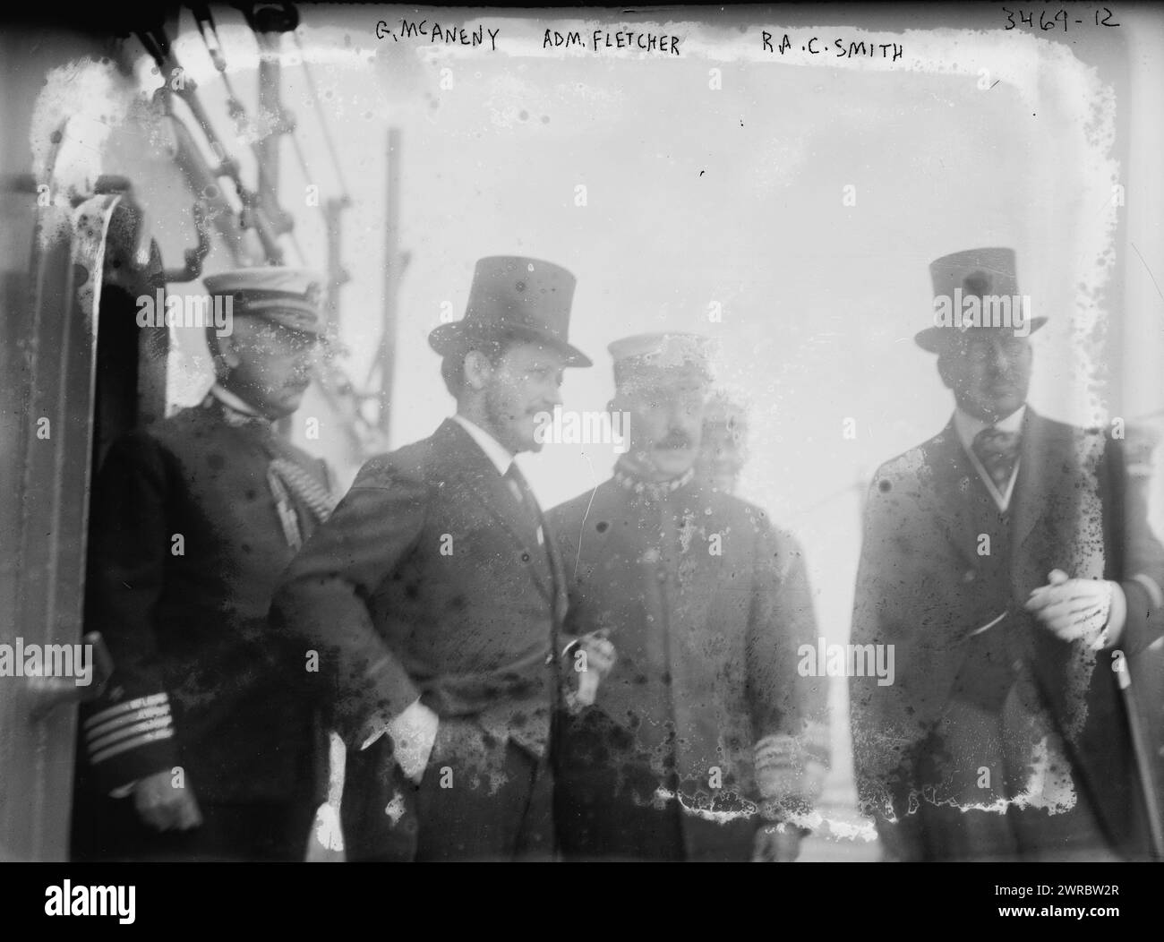 G. McAneny, Adm. Fletcher, R.A.C. Smith, Photograph shows U.S. Navy Admiral Frank Friday Fletcher (1855-1928), Commander of the Atlantic fleet; Robert A.C. Smith (1857-1933), Commissioner of Docks in New York City and Acting Mayor of New York George Francis McAneny (1869-1953). The men were probably gathered on the USS Wyoming for the Naval review of May, 1915., 1915 May, Glass negatives, 1 negative: glass Stock Photo