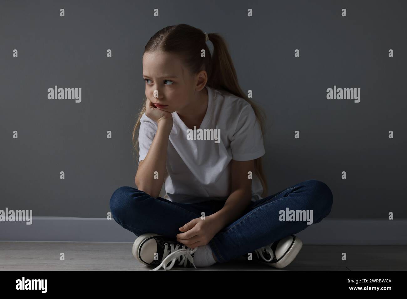 Sad girl preteen sitting on hi-res stock photography and images - Alamy