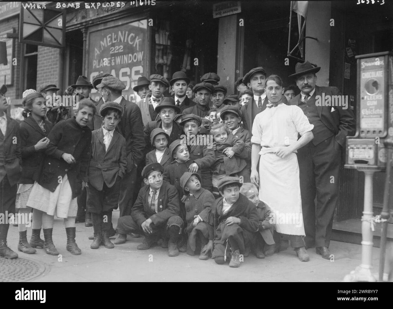 Where bomb exploded, Photograph shows a crowd gathering at 222 Layfayette Street after the bombing of the Italian Consulate at 226 Lafayette St, on Cleveland Place in Little Italy, New York City on November 5, 1915., 1915 6 Nov., Glass negatives, 1 negative: glass Stock Photo