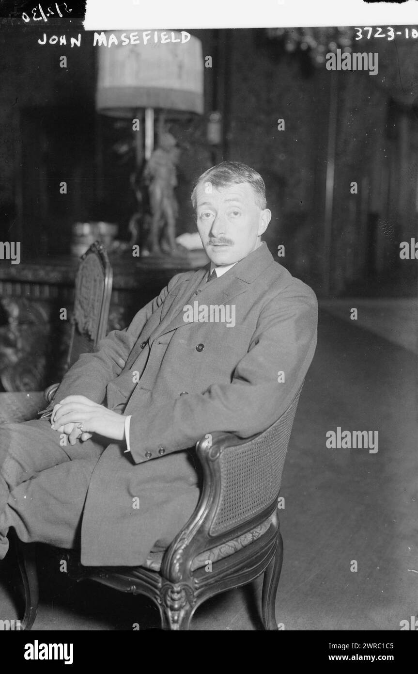 John Masefield, Photograph shows English poet and writer John Edward Masefield (1878-1967) who was Poet Laureate of the United Kingdom (1930-1967)., 1916 Jan. 13, Glass negatives, 1 negative: glass Stock Photo