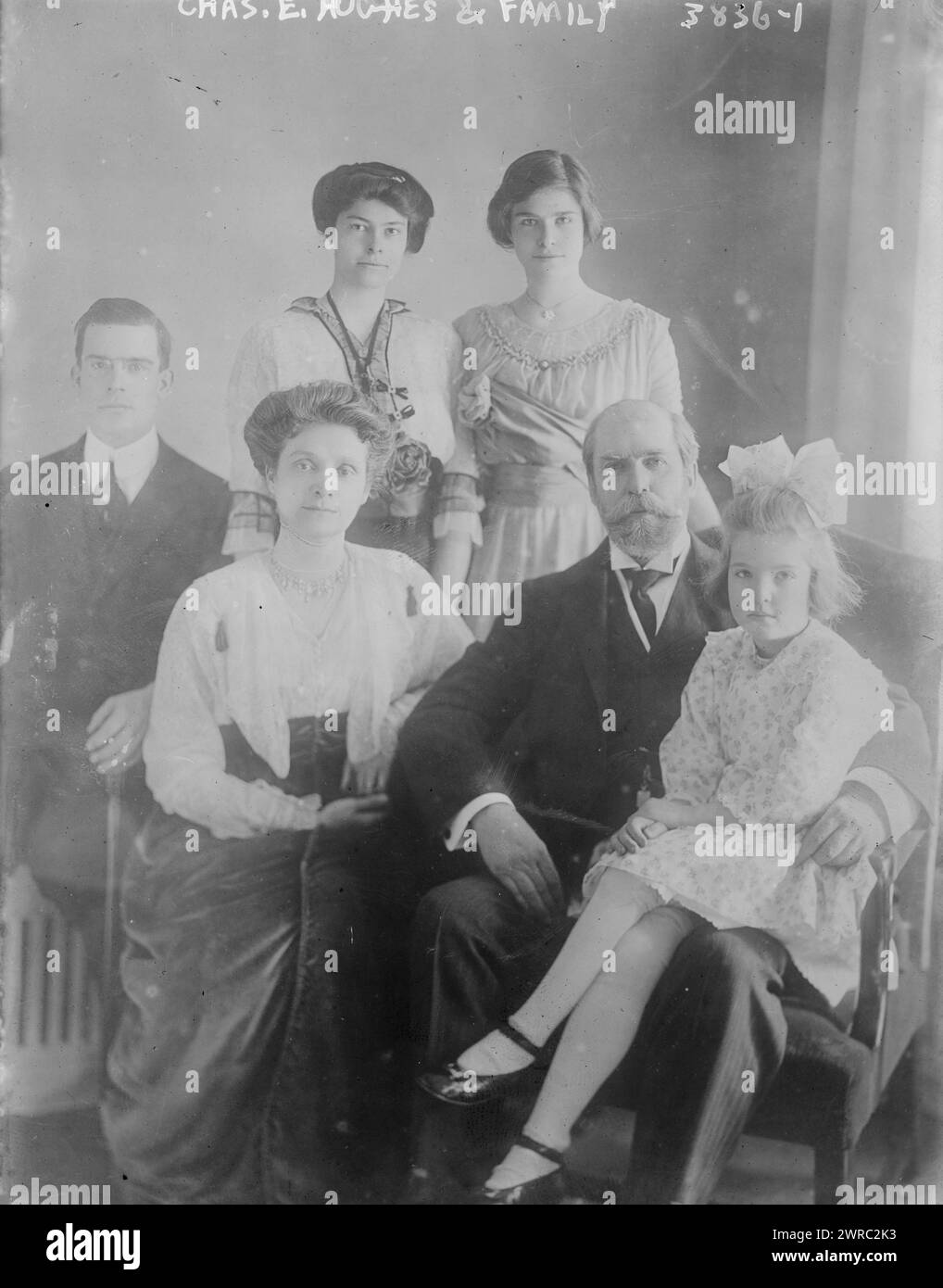 Chas. E. Hughes and Family, Photograph shows Charles Evans Hughes (1862-1948) with his family. Included are his wife Antoinette Carter Hughes and children: Charles, Jr.; Helen, Catherine and Elizabeth., between ca. 1915 and ca. 1920, Glass negatives, 1 negative: glass Stock Photo