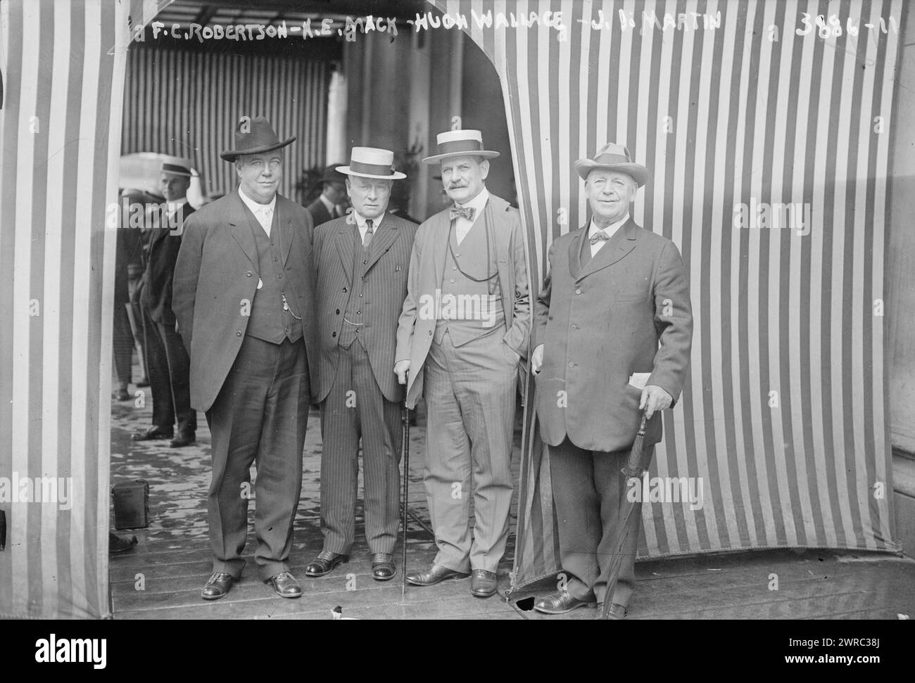 F.C. Robertson, H.E. Mack, Hugh Wallace, J.I. Martin, Photograph shows from left, Frederick C. Robertson, Norman Edward Mack, Hugh Campbell Wallace and Colonel John I. Martin at the 1916 Democratic National Convention held in St. Louis, Missouri from June 14-16., 1916 June, Glass negatives, 1 negative: glass Stock Photo