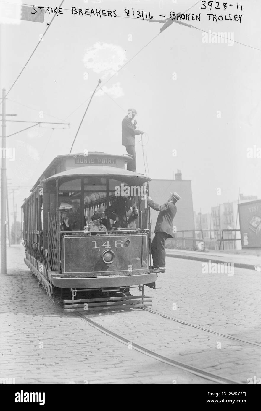 Strike breakers, broken trolley, Photograph probably taken during the streetcar strike in New York City which took place in July and August of 1916., 1916 Aug. 3, Glass negatives, 1 negative: glass Stock Photo