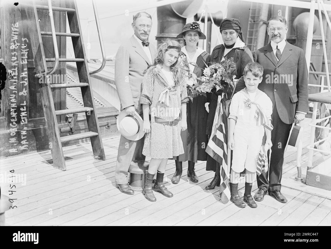 H. Morgenthau, A.I. Elkus & wife, Kath., Ethel & J.H. Elkus, Photograph shows U.S. Ambassador to the Ottoman Empire Abram I. Elkus (1867-1947), leaving New York on August 17, 1916 on the ocean liner Oscar II with his wife Gertrude Hess Elkus, daughters Ethel J. and Katharine, and his son James Hess Elkus. Previous ambassador Henry Morgenthau (1856-1946) stands with them., between ca. 1915 and ca. 1920, Glass negatives, 1 negative: glass Stock Photo