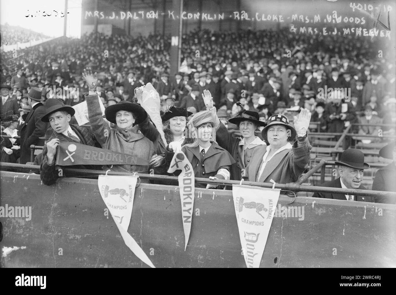 J. Woods, Mrs. J. Dalton, K. Conklin, R.L. Cloke, Mrs. M.V. Woods, Mrs. E.J. McKeever, Photograph shows Brooklyn baseball fans at the 1916 World Series seated with Jennie Veronica Murphy McKeever (1862-1942), wife of one of the Brooklyn team's owners., 1916, Glass negatives, 1 negative: glass Stock Photo