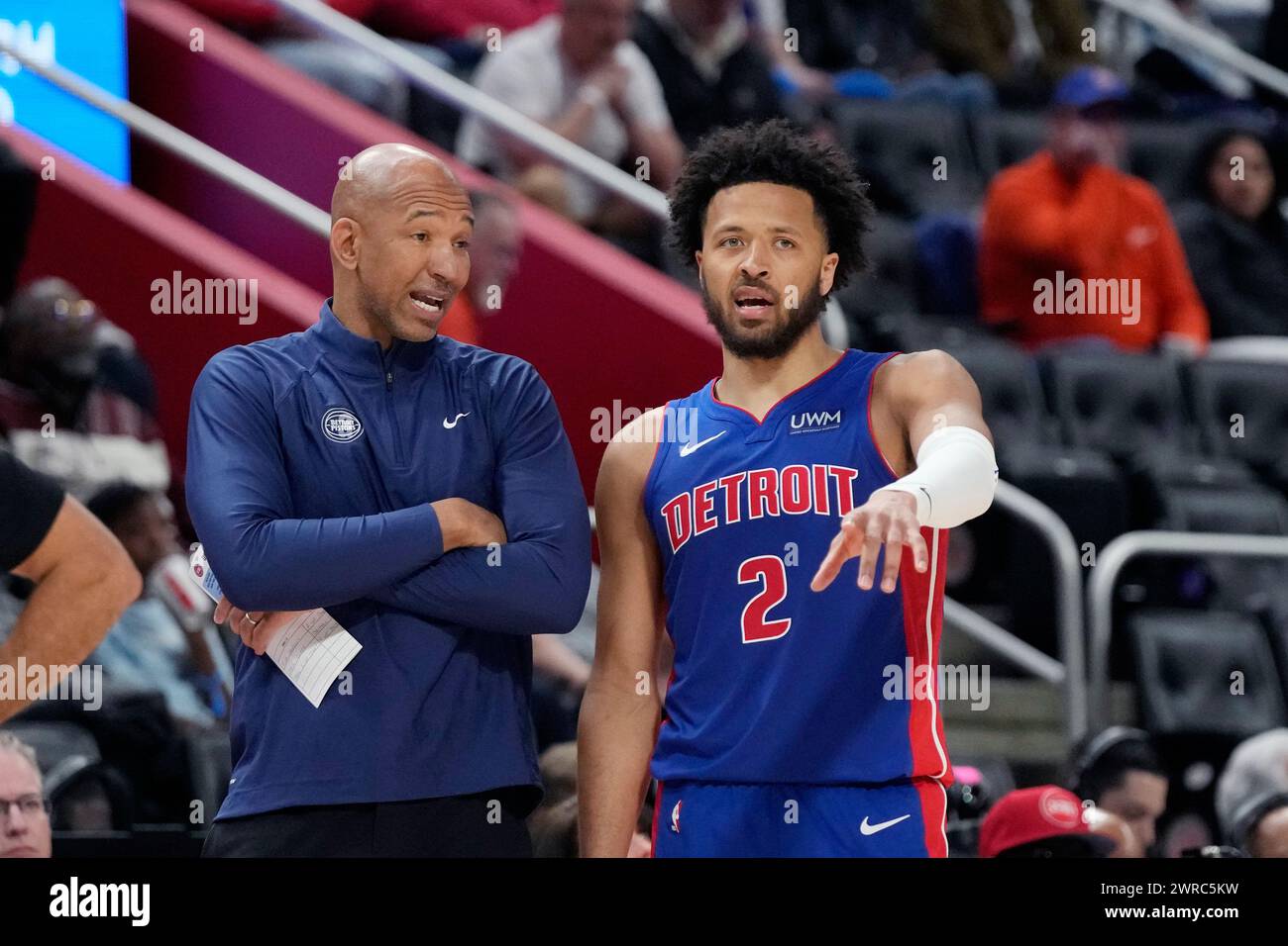 Detroit Pistons head coach Monty Williams talks with guard Cade Cunningham during the second