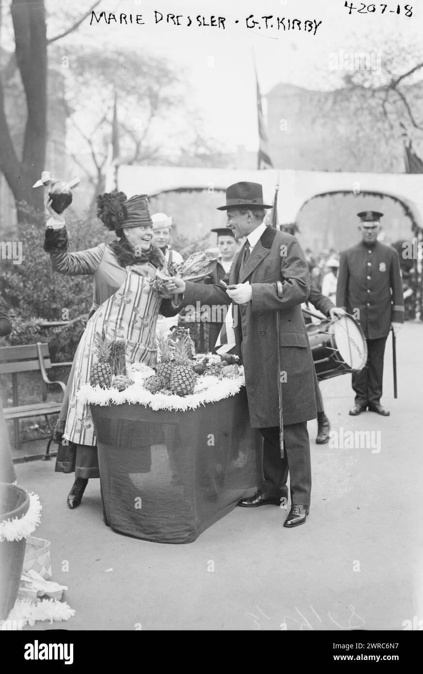 Marie Dressler, G.T. Kirby, Photograph shows Marie Dressler (1868-1934), a Canadian American stage and screen actress and Gustavus Town Kirby (1874-1934) at the Greenwich Village Garden Party in Washington Square Park, New York City, sponsored by the National League for Women's Service to benefit the Red Cross and other war relief agencies., 1917 June, Glass negatives, 1 negative: glass Stock Photo