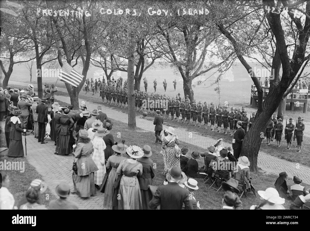 Presenting colors, Gov. Island, Photograph shows people watching ...