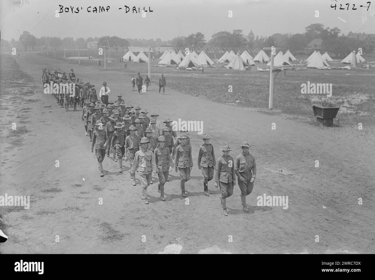 Boy's camp - drill, Photograph shows boys drilling at the summer military training camp for boys at Peekskill, New York. The camp was organized by the New York State Military Training Commission., 1917 July 16, Glass negatives, 1 negative: glass Stock Photo