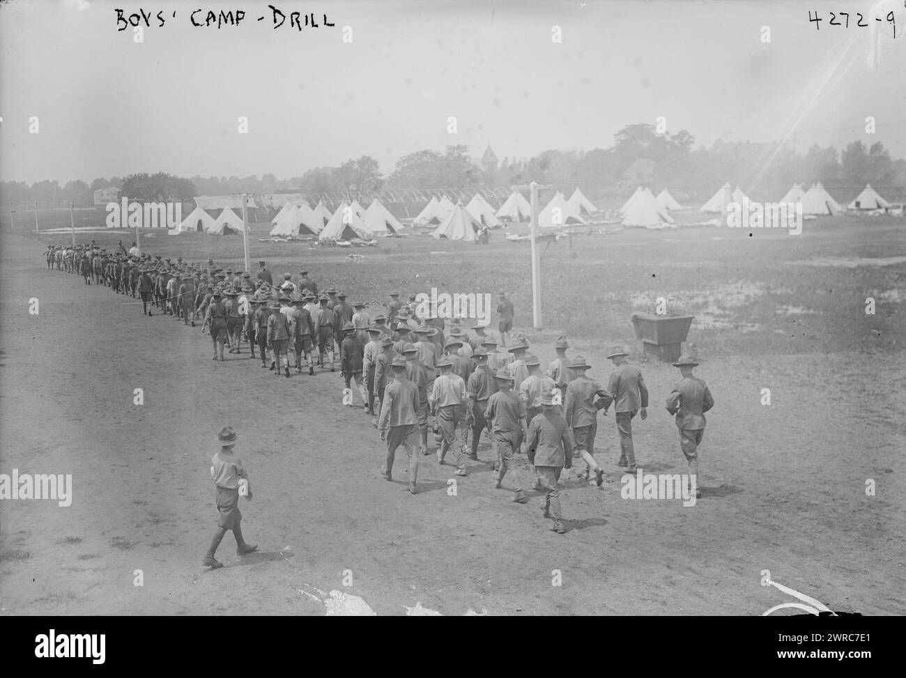 Boy's Camp drill, Photograph shows boys drilling at the summer military training camp for boys at Peekskill, New York. The camp was organized by the New York State Military Training Commission., 1917 July 16, Glass negatives, 1 negative: glass Stock Photo