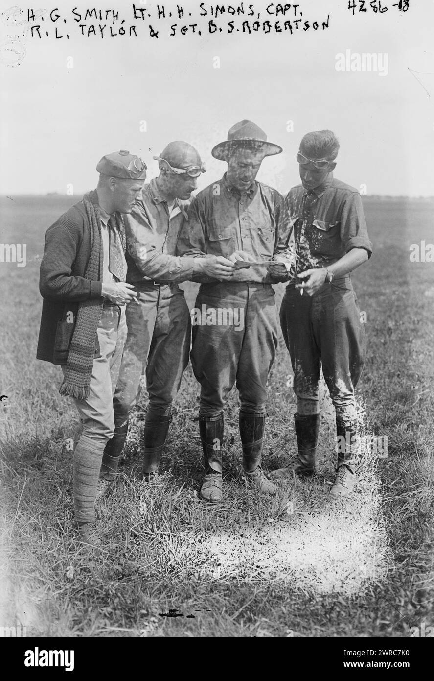 H.G. Smith, Lt. H.H. Simons, Capt. R.L. Taylor & Sgt. B.S. Robertson, Photograph shows instructor H.G. Smith, First Lt. Henry H. Simons, Capt. R.L. Taylor and First Lt. Benjamin S. Robertson who were a part of the Signal Corps Aviation School at Mineola, Long Island, New York, between May and August of 1917 during World War I., 1917, World War, 1914-1918, Glass negatives, 1 negative: glass Stock Photo