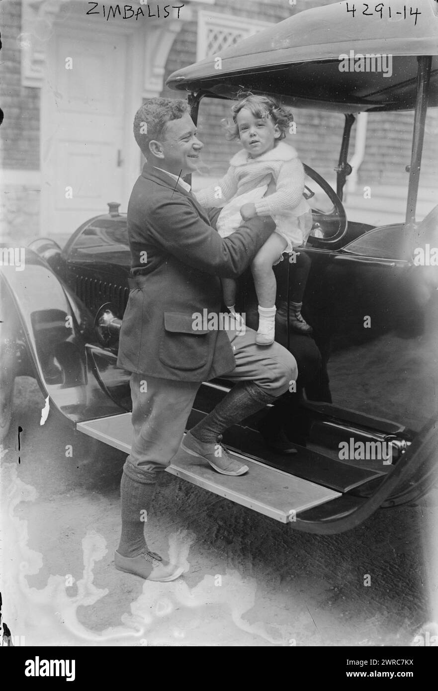 Zimbalist, Photograph shows Efrem Zimbalist Sr. (1889/90-1985), an internationally known concert violinist, composer, teacher, conductor, and director of the Curtis Institute of Music with his daughter Maria, vacationing possibly on Fishers Island, New York in August of 1917., 1917 August, Glass negatives, 1 negative: glass Stock Photo