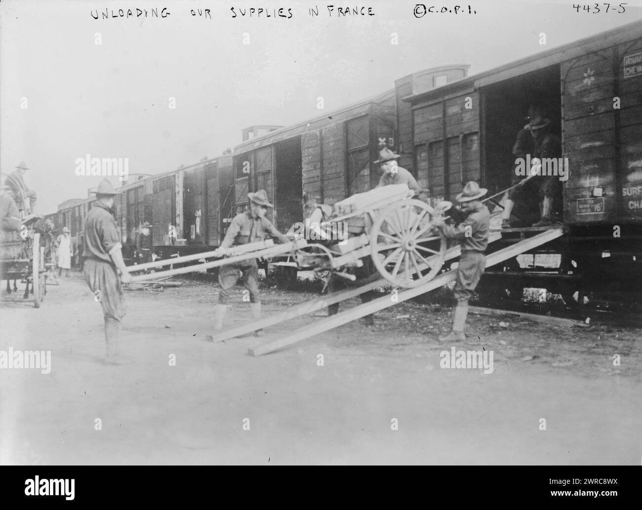 Unloading our supplies in France, Photograph shows American soldiers ...