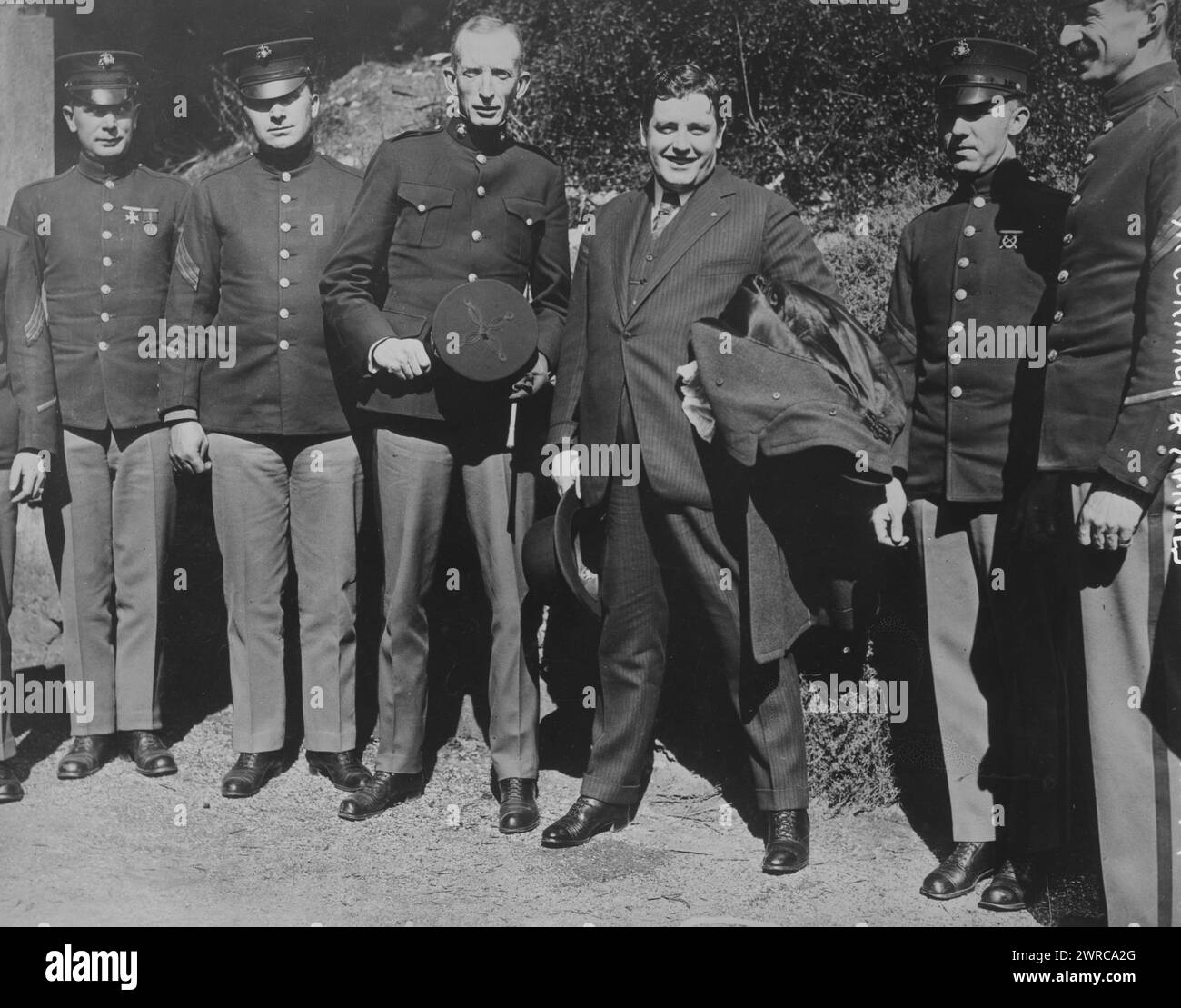 McCormack & Marines, Photograph shows Irish American tenor singer John McCormack (1884-1945) with U.S. Marine Corps soldiers., between ca. 1915 and ca. 1920, Glass negatives, 1 negative: glass Stock Photo