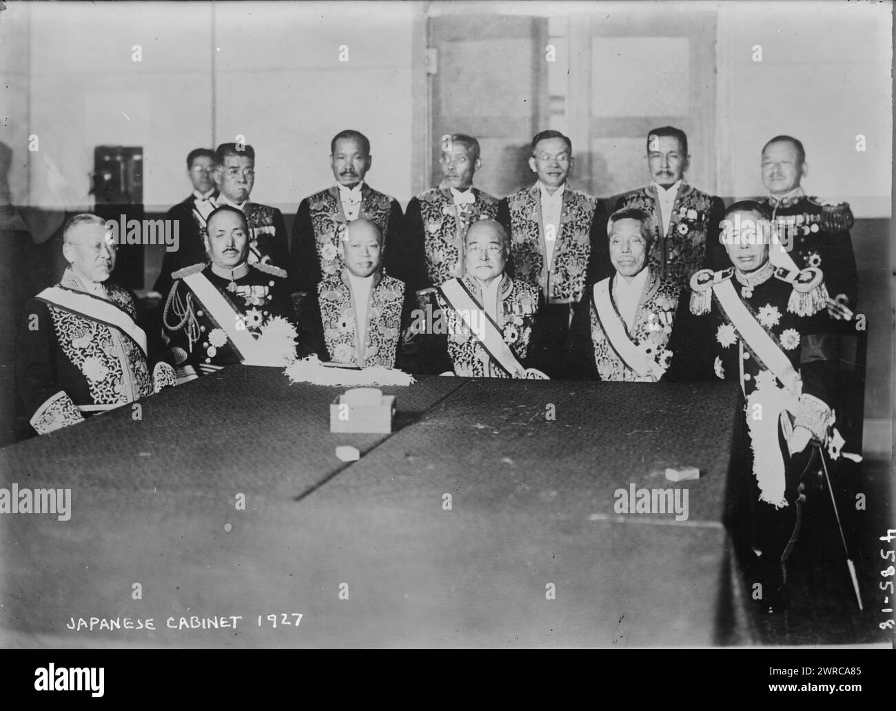 Japanese cabinet, 1927, Photograph shows a group portrait of the Japanese cabinet including Prime Minister Baron Tanaka Giichi (1863-1929), seated far right, and his successor Osachi Hamaguchi (1870-1931), standing 4th from right., 1927, Glass negatives, 1 negative: glass Stock Photo