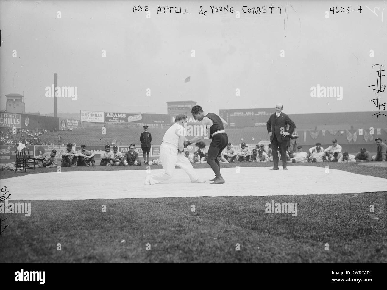 Abe Attell & Young Corbett, Photograph shows Attell and Corbett wrestling on a mat, part of the pre-game entertainment for the Cleveland Indians vs. the New York Yankees game at the Polo Grounds, New York City, May 27, 1918., 1918 May 28, Glass negatives, 1 negative: glass Stock Photo