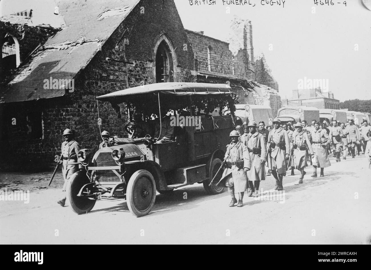 British funeral, Cugny, Photograph shows vehicle and soldiers passing a church during a funeral in Cugny, France, probably during World War I., between ca. 1915 and ca. 1920, World War, 1914-1918, Glass negatives, 1 negative: glass Stock Photo