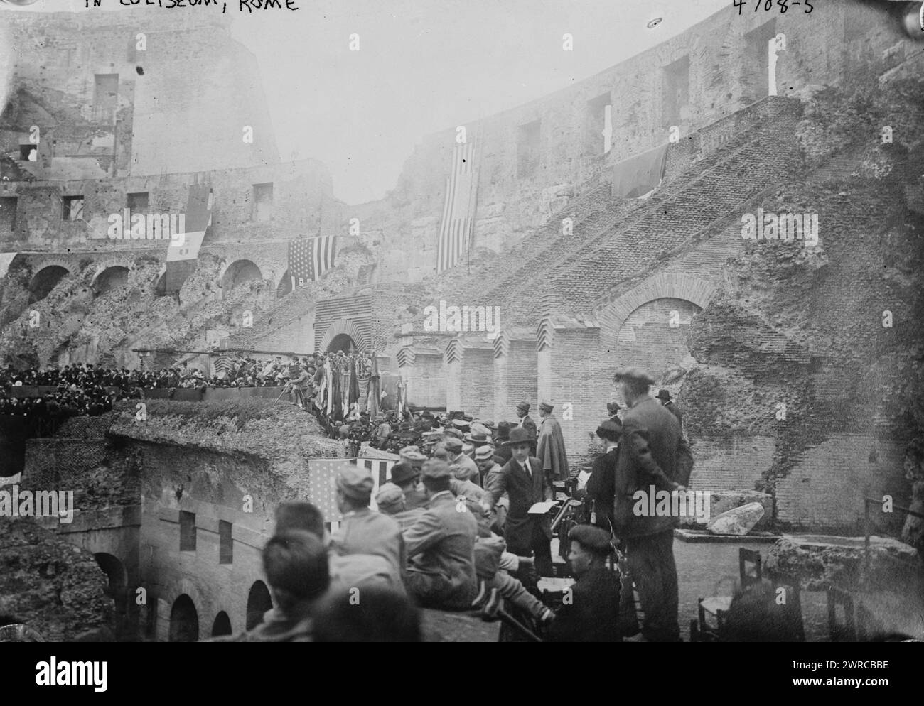 In Coliseum, Rome, Photograph shows flags and people in the Colosseum (Coliseum), Rome, Italy during the visit of President Woodrow Wilson on January 4, 1919., between ca. 1915 and 1919, Rome, Glass negatives, 1 negative: glass Stock Photo