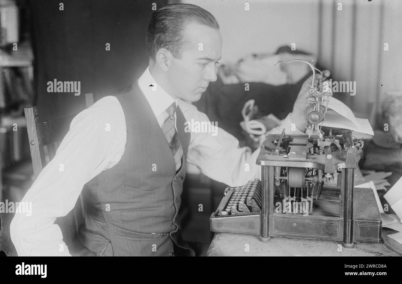 Steel, Photograph shows American tenor singer John W. Steel (1895-1971) seated at a typewriter., between ca. 1915 and ca. 1920, Glass negatives, 1 negative: glass Stock Photo