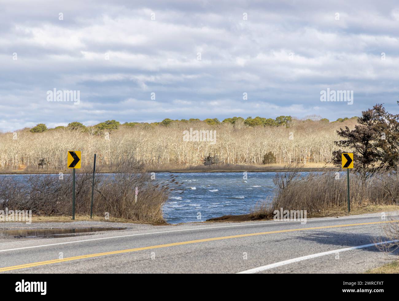 landscape with new north highway and cold spring pond Stock Photo