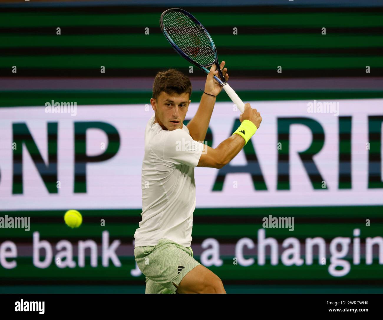 March 11, 2024 Luca Nardi of Italy returns a shot against Novak Djokovic of Serbia during the BNP Paribas Open in Indian Wells, CA. Charles Baus/CSM Stock Photo