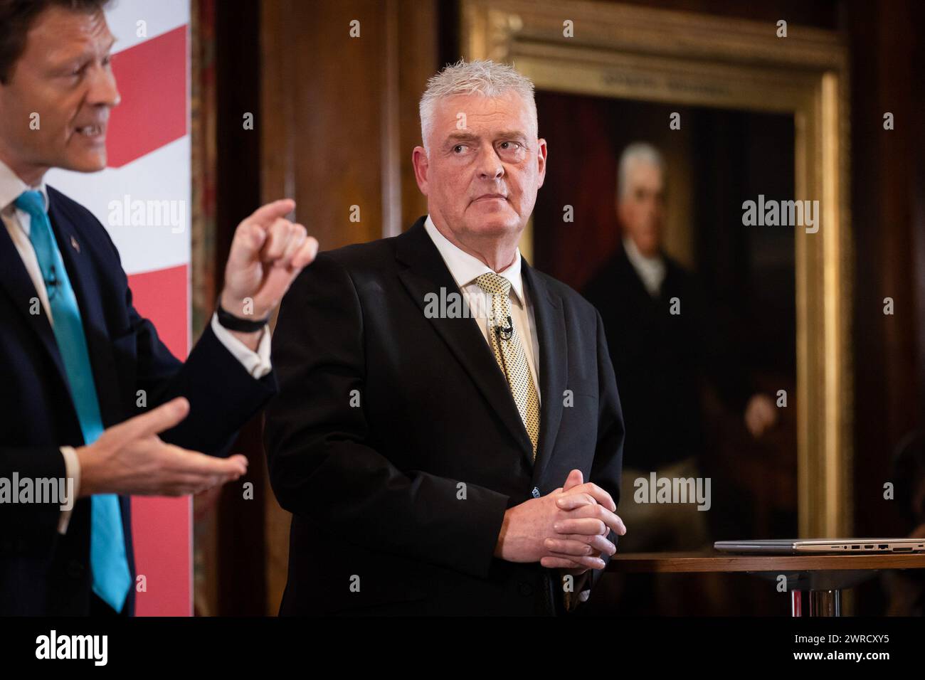 London, UK. 11th Mar, 2024. MP for Ashfield Lee Anderson listens during a press conference. Anderson has defected from the Conservatives to Reform UK after his comments on Sadiq Khan being ëin the pocket of Islamistsí led to the Conservative whip being withdrawn from him. Credit: SOPA Images Limited/Alamy Live News Stock Photo