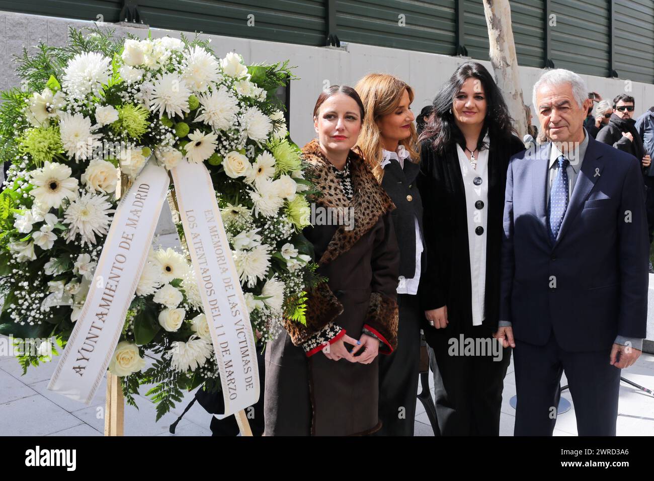 11 March 2024, Spain, Madrid: Andrea Levi, Councillor for Culture, Tourism and Sport, Carmen Martin, Vice-Minister for Justice and Victims of the Community of Madrid, Rocio Lopez, Commissioner for the Care of Victims of Terrorism, and Eulogio Paza, President of the Association 11-M Victims of Terrorism, stand next to a wreath in memory of the victims of the bombing at Atocha station. The Islamist train attacks in Madrid, which left more than 190 people dead and around 2000 injured on the morning of March 11, 2004, involved a series of simultaneous bomb attacks on a commuter train. Photo: Cesar Stock Photo