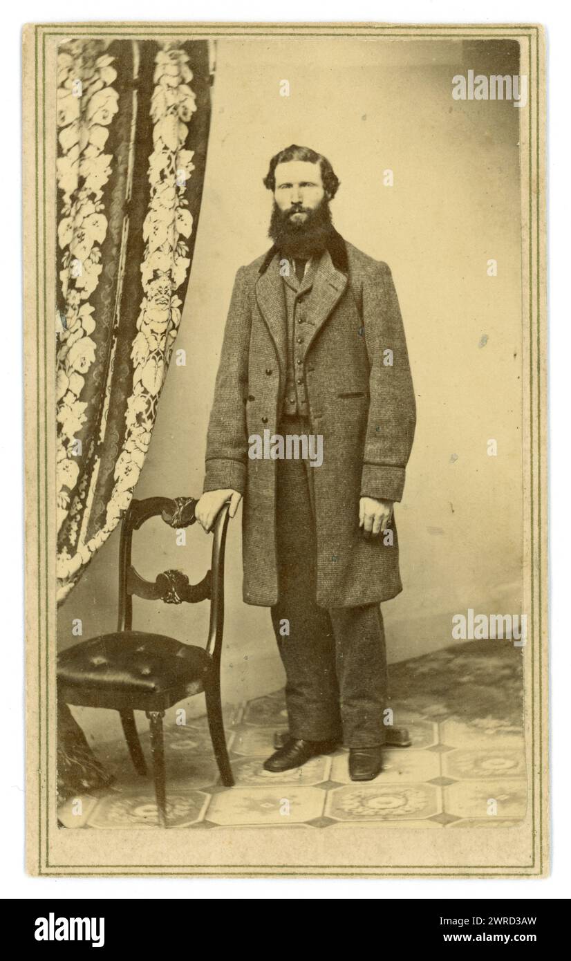 Original Victorian era Carte de Visite (visiting card or CDV) of American man, long beard, by photographic studio of D. A. Simons, 27 & 28 Smyths Block, Manchester, New Hampshire, U.S.A. Circa 1860's. Stock Photo