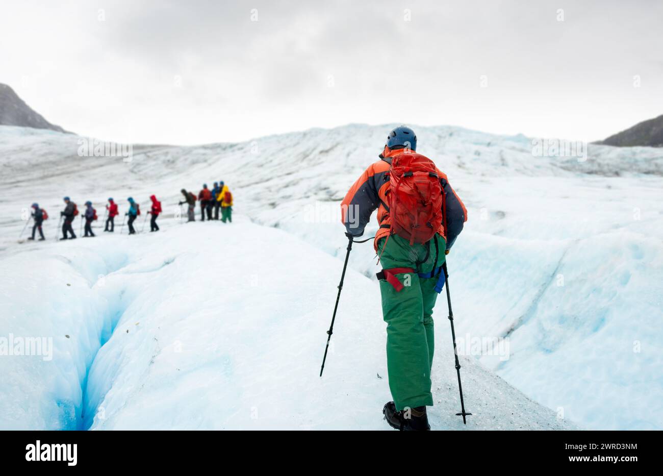 Exit Glacier ice hiking. People wearing ice crampons and walking on glaciers. Kenai Fjords National Park. Alaska. Stock Photo